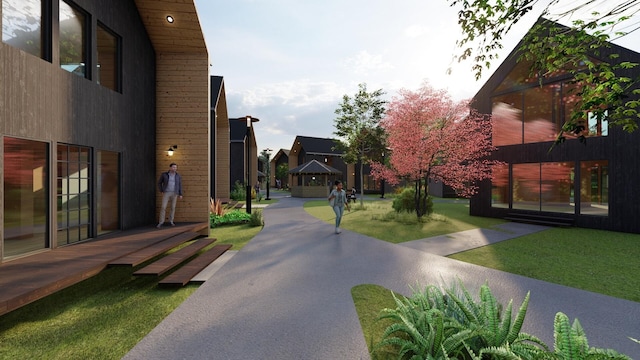 surrounding community featuring a lawn