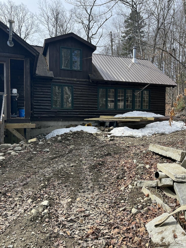 45 Dickson Rd, Carrying Place Town Twp, ME 04961 - exterior space with log siding