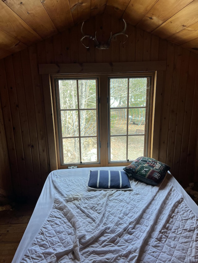 45 Dickson Rd, Carrying Place Town Twp, ME 04961 - bedroom featuring wood ceiling, wooden walls, vaulted ceiling, and multiple windows
