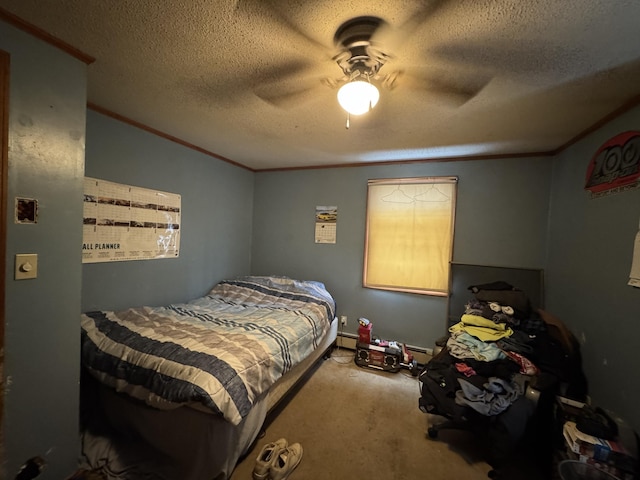 bedroom with a textured ceiling, ceiling fan, ornamental molding, and carpet flooring