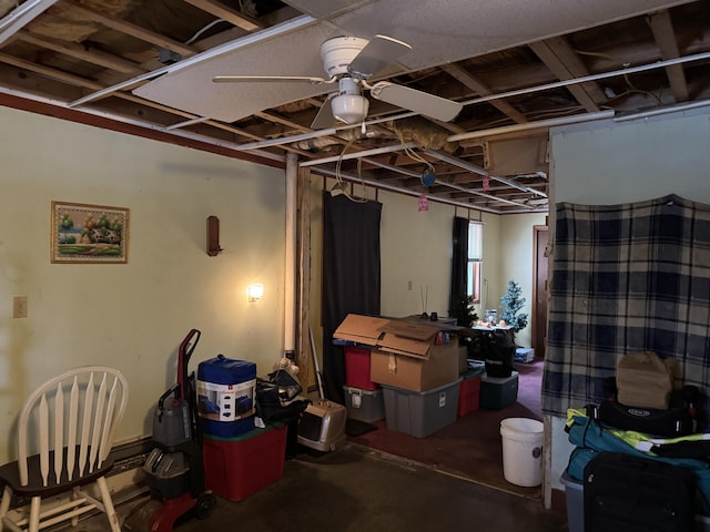 basement featuring ceiling fan