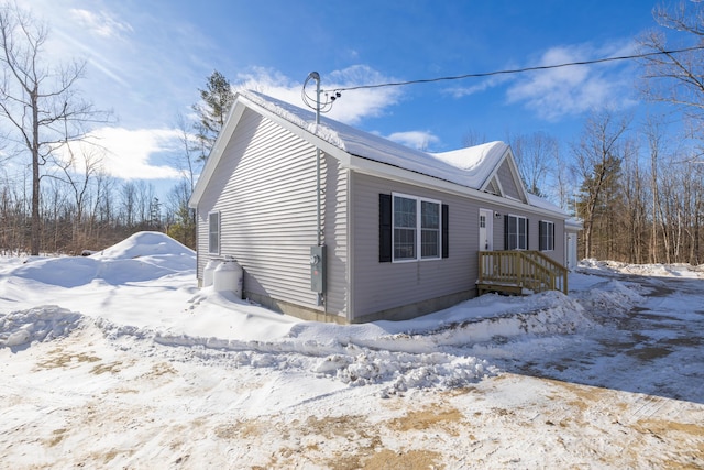 view of snow covered property