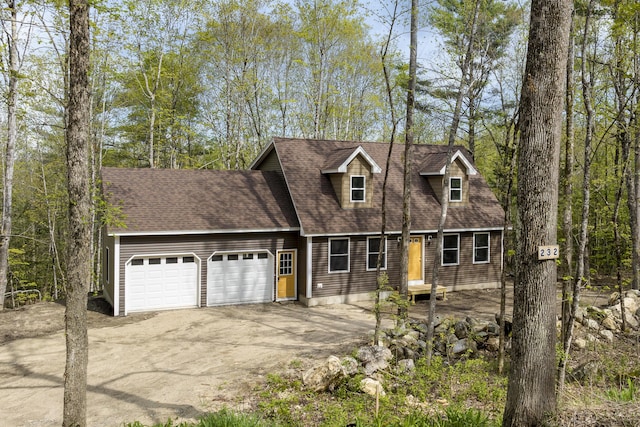 232 Bond Spring Rd, Newfield, ME 04095 - view of front of house with a garage, driveway, and roof with shingles
