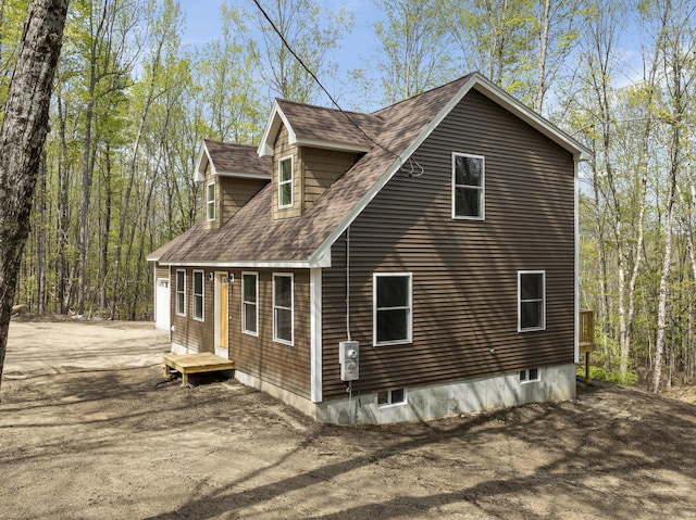 232 Bond Spring Rd, Newfield, ME 04095 - view of side of property featuring roof with shingles