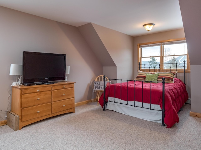 bedroom featuring light colored carpet