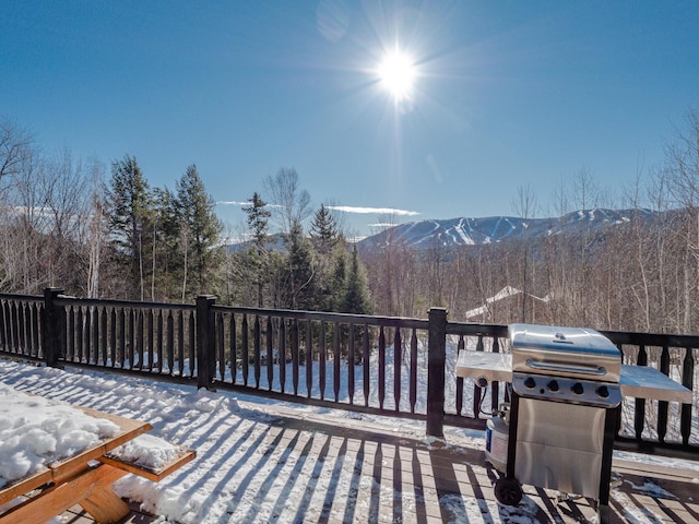 deck featuring area for grilling and a mountain view