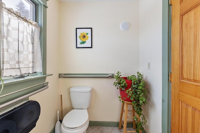 bathroom featuring toilet