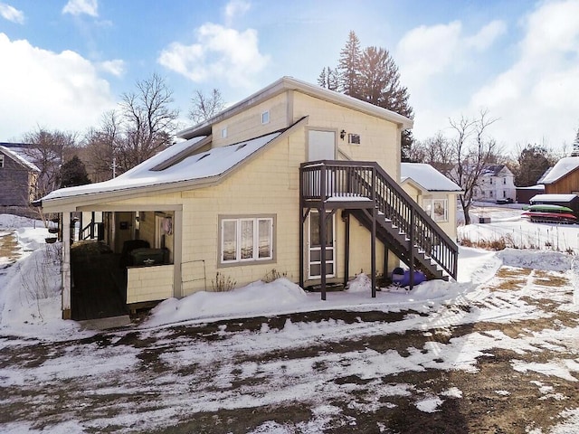 view of snow covered property