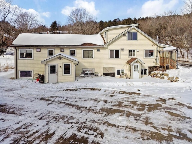 view of snow covered property