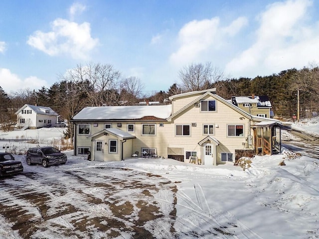 view of snow covered property