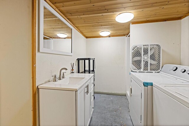 6 Stoddard Ln, Hallowell, ME 04347 - laundry room featuring wooden ceiling, washer and dryer, and cabinet space