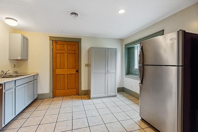 6 Stoddard Ln, Hallowell, ME 04347 - kitchen with appliances with stainless steel finishes, light countertops, gray cabinetry, light tile patterned flooring, and recessed lighting