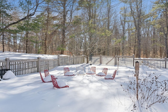 view of yard covered in snow