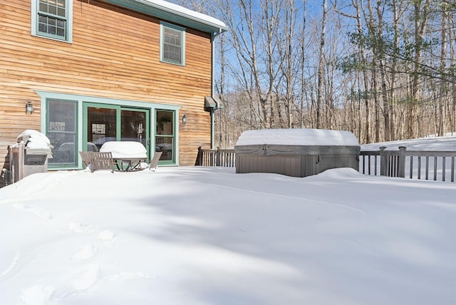 exterior space featuring a hot tub and area for grilling