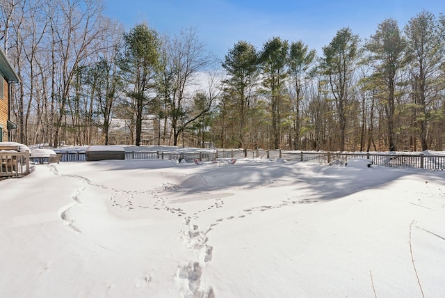 view of yard covered in snow