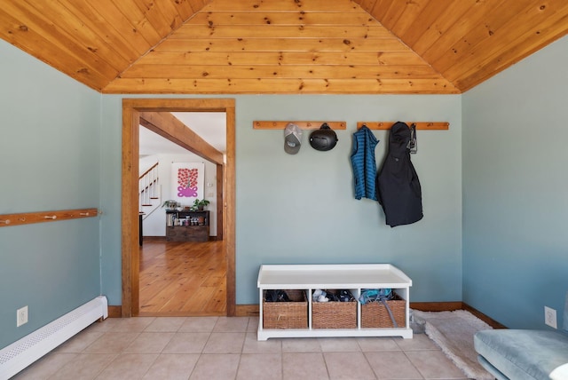 mudroom with a baseboard heating unit, lofted ceiling, wooden ceiling, and light tile patterned flooring