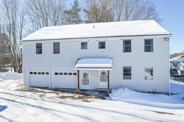 colonial house featuring a garage