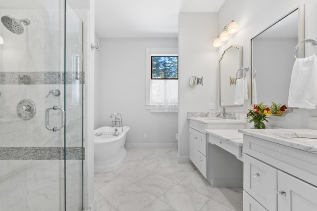 full bath featuring baseboards, marble finish floor, a freestanding bath, vanity, and a shower stall