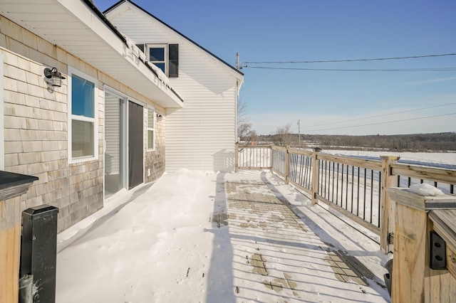 view of snow covered deck