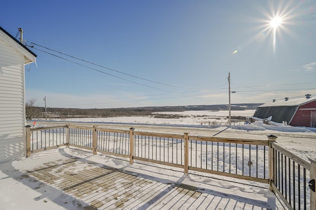 view of snow covered deck