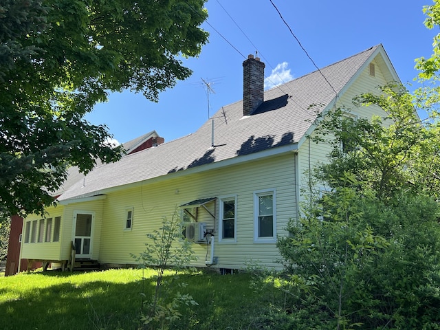 96 Exeter Rd, Garland, ME 04939 - rear view of house featuring entry steps and a chimney