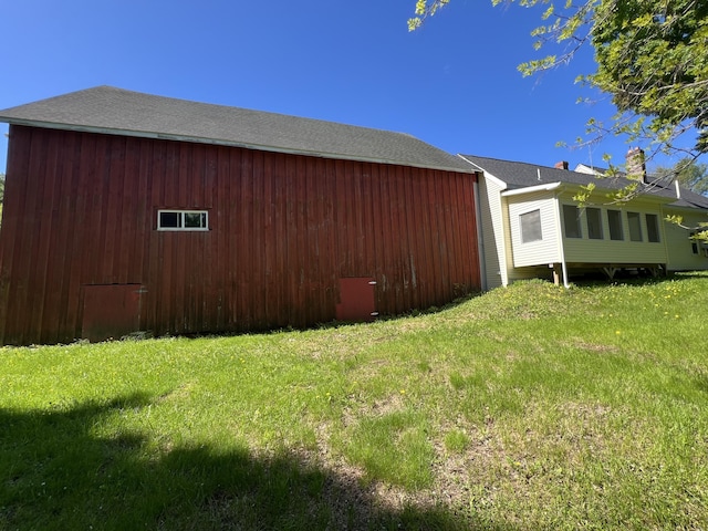 96 Exeter Rd, Garland, ME 04939 - view of property exterior with a lawn, an outdoor structure, and an outbuilding
