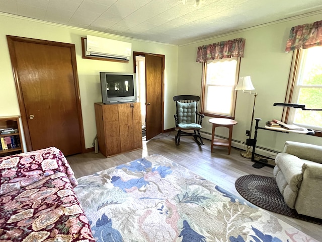 96 Exeter Rd, Garland, ME 04939 - bedroom with a wall unit AC, multiple windows, wood finished floors, and crown molding