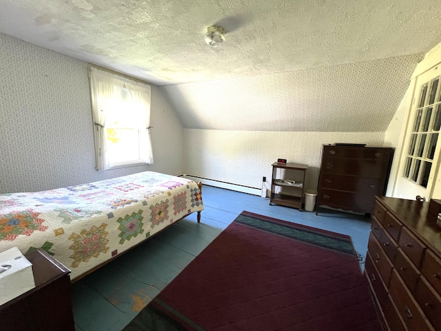 96 Exeter Rd, Garland, ME 04939 - bedroom featuring baseboard heating, a textured ceiling, and vaulted ceiling