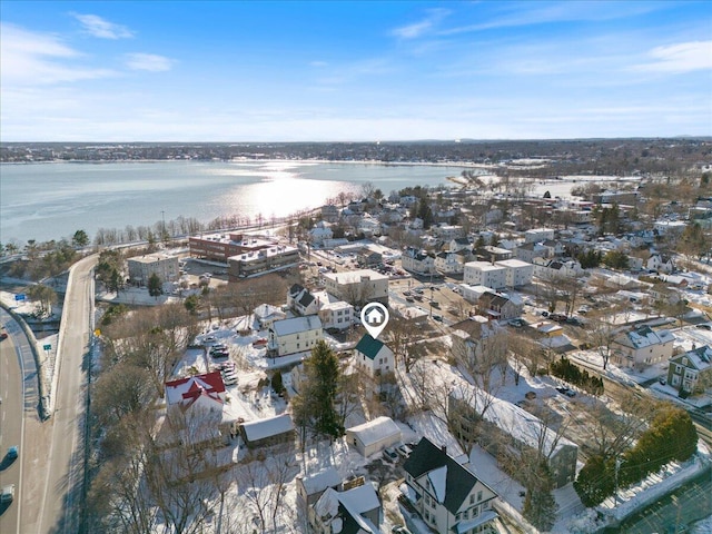 bird's eye view with a water view and a residential view