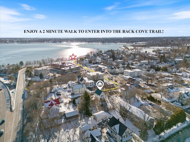 bird's eye view with a water view and a residential view