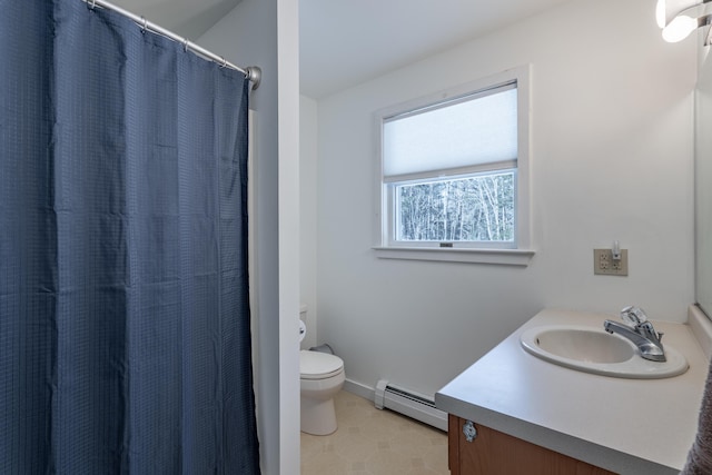 full bath featuring curtained shower, toilet, baseboard heating, vanity, and tile patterned floors