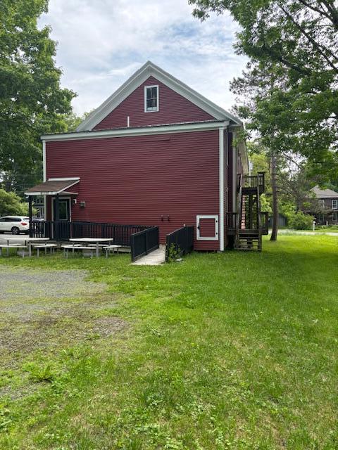 12 Church Rd, Readfield, ME 04355 - view of property exterior featuring a lawn