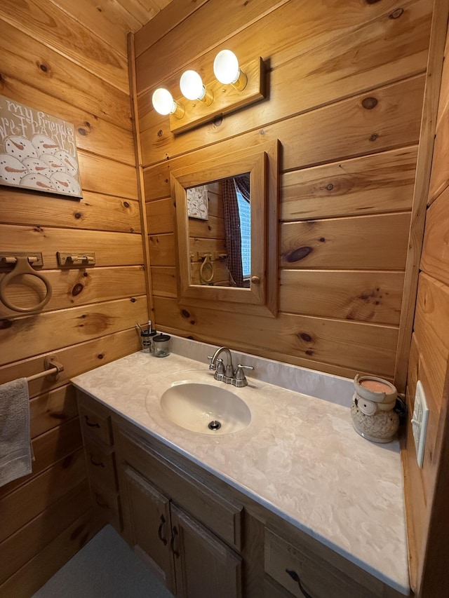 9 Ledge Dr, Greenville, ME 04441 - bathroom featuring vanity and wooden walls