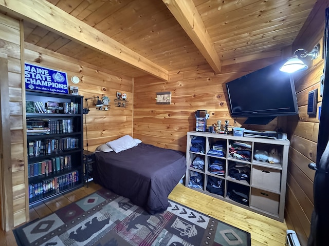9 Ledge Dr, Greenville, ME 04441 - bedroom with hardwood / wood-style flooring, a baseboard heating unit, wooden walls, wood ceiling, and beamed ceiling