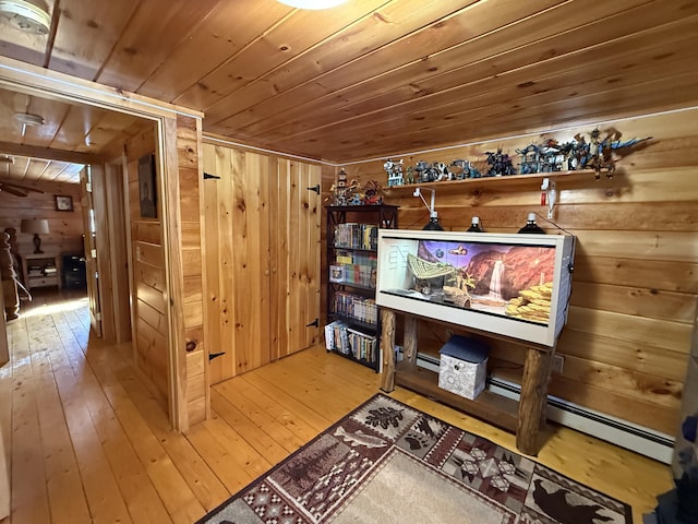 9 Ledge Dr, Greenville, ME 04441 - living room featuring wood-type flooring, wood walls, and wood ceiling