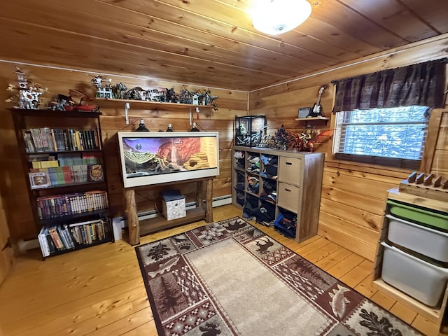 9 Ledge Dr, Greenville, ME 04441 - sitting room featuring wooden ceiling, wood walls, and hardwood / wood-style floors