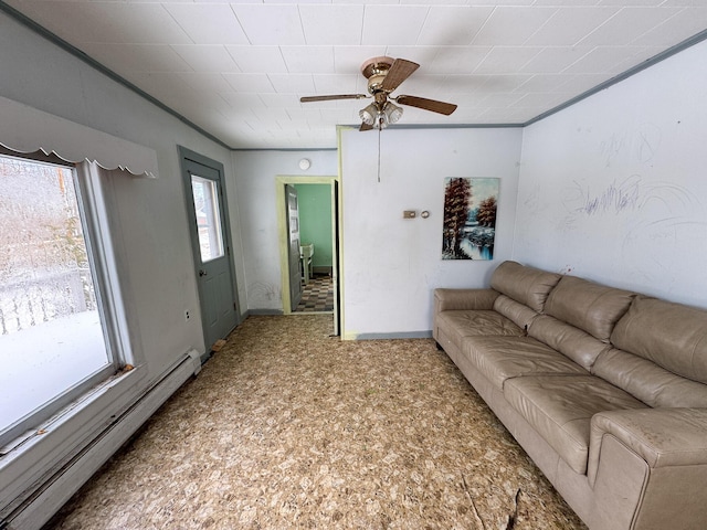 living room with ceiling fan, a baseboard radiator, and baseboards