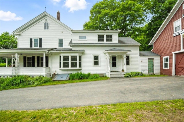 49 Old Village Rd, Winthrop, ME 04364 - view of front of property with a chimney and driveway