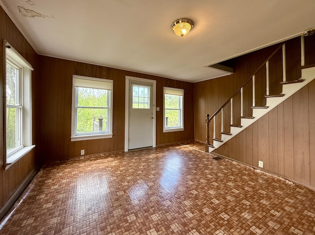 149 Old Eastport Rd, Perry, ME 04667 - foyer entrance with wood walls and stairway