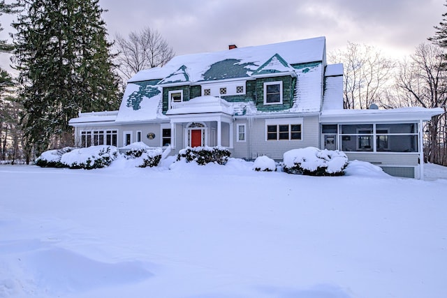 shingle-style home with a chimney