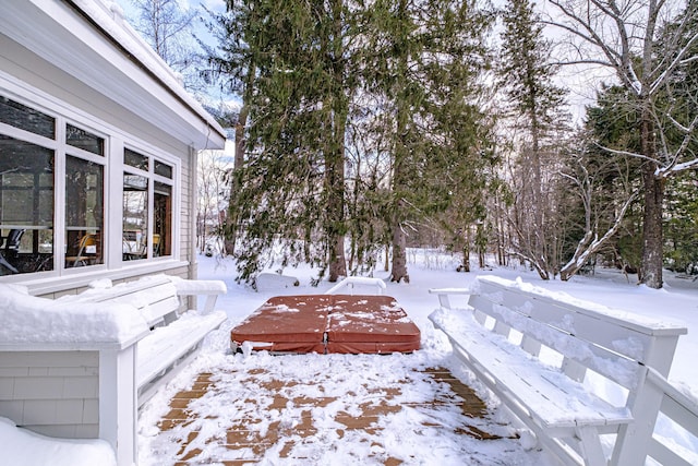 exterior space with a hot tub