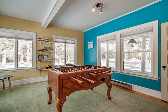 playroom featuring crown molding, beamed ceiling, a baseboard radiator, and baseboards