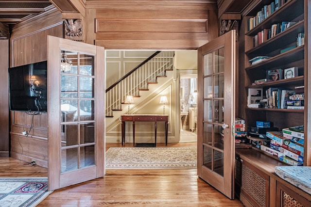 interior space featuring french doors and light wood-style floors