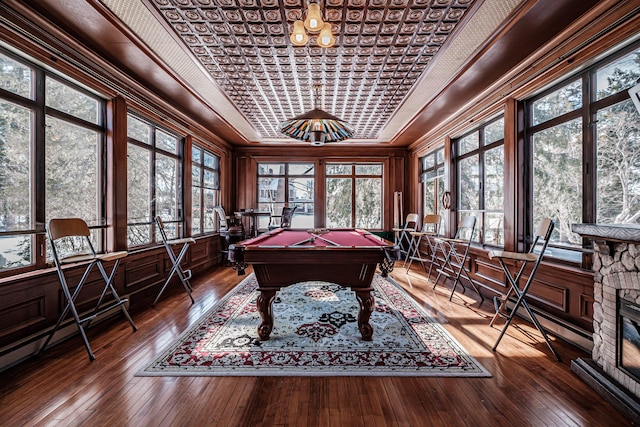 rec room featuring an ornate ceiling, a raised ceiling, pool table, and wood finished floors