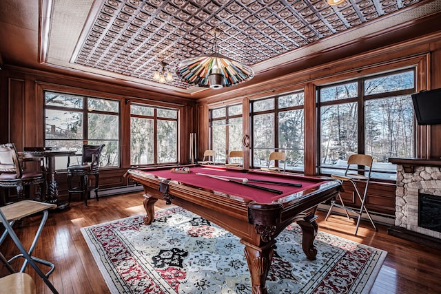 playroom with pool table, dark wood-type flooring, and an ornate ceiling