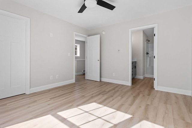 unfurnished bedroom featuring baseboards, a ceiling fan, and light wood finished floors