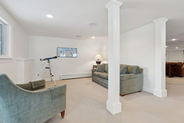 living room featuring decorative columns, baseboards, light colored carpet, baseboard heating, and recessed lighting