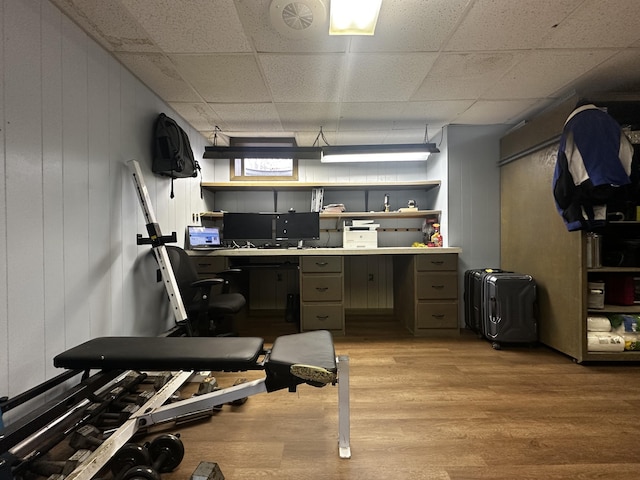 home office with light wood-style floors