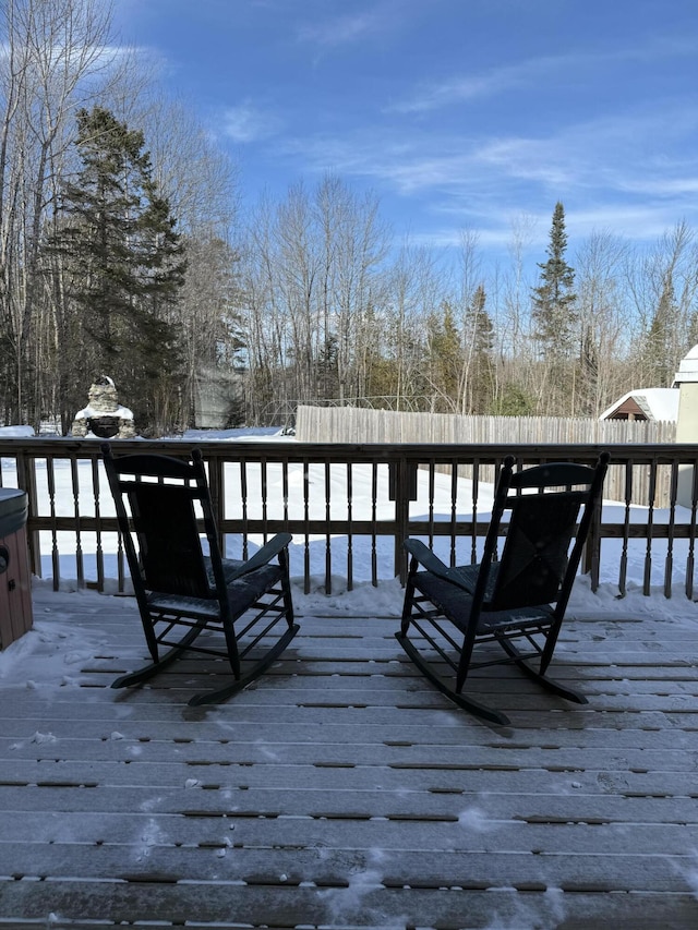 view of snow covered deck