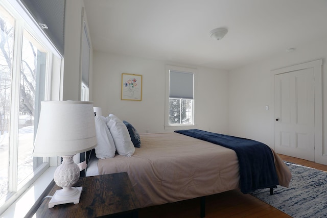 bedroom with wood finished floors